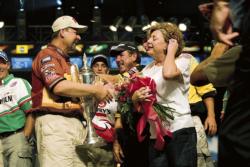 George Cochran is congratulated by his wife, Debi, and other FLW Tour competitors after winning the 2005 Forrest L. Wood Championship.