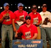Matthew Hiller proudly displays his trophy after becoming the Wal-Mart FLW Walleye Tour co-angler champion.