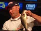 No. 7 co-angler Arch Cornett weighs in the only bass he caught today, a 1-pound, 15-ouncer.