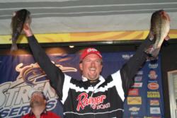 Jimmy Reese of Witter Springs, Calif., celebrates victory on Clear Lake by holding up part of his two-day 40-pound, 8-ounce catch.