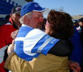 Jack Adams embraces his fiance after learning he took first place in the Co-angler Division.