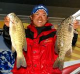 Kenta Kimura is all smiles after catching four bass that weighed 8 pounds, 12 ounces on Friday. Kimura starts the final day in second place on the co-angler side.
