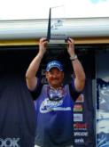 Tommy Dickerson shows off his first-place trophy from Lake Texoma.