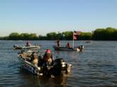 FLW Walleye Tour anglers take off one by one to the open waters of the Mississippi River.