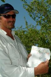 Sean Stafford shows us his secret, high-tech fish-finder: colored pencils on notebook paper.