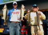 Jason Kerr and Gary Engberg show off their day-three catch that weighed 25 pounds, 5 ounces.