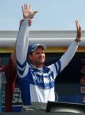 Mike Hawkes holds his hands up in victory after taking the Lake Cumberland win.