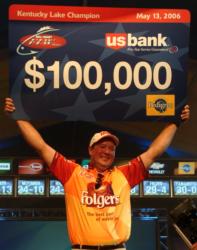 Pro Steve Kennedy of Auburn, Ala., collects his second $100,000 check in Wal-Mart FLW Tour competition at Kentucky Lake.