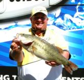 Jim Nolan shows off his kicker fish from day one on the Sam Rayburn Reservoir.