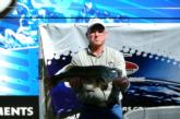 Mike Wisenbaker shows off a Sam Rayburn bass that weighed 6 pounds, 5 ounces. Wisenbaker sits in third place in the Co-angler Division.