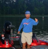 Sixth-place pro Bradley Stringer of Huntington, Texas, prepares his tackle for the final day of competition on Sam Rayburn.