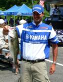 Jerreth Bain shows off the biggest bass he caught on day one of the Old Hickory Lake FLW Series event.