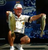 Pro Stacey King holds up part of his five-bass limit that weighed 14 pounds, 9 ounces. After day one, King is tied for fifth place.