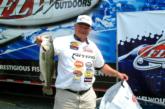 Pro Woo Daves holds up his biggest bass from day two on Old Hickory Lake. Daves sits in fourth place with two days remaining in the tournament.