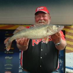Sauk Centre, Minn., pro Pete Harsh shows off a big walleye caught earlier this season at a FLW tournament.