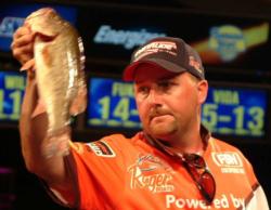 After leading his co-angler to victory, Tracy Adams put himself only 2 ounces behind the leader with a day-three catch of 16-12.
