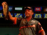 Robert Walser shows the crowd one of his tournament-winning bass. His three-day weight totaled 34 pounds, 10 ounces.