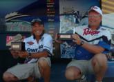 Co-angler Chad Wertepny and pro Wayne Butz show off their first-place trophies. 