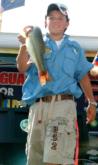 Chandler Young of Independence, Kan., shows off a bass that helped put him in third place in the 11 to 14 division at the National Guard Junior World Championship.