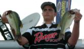 Blake Felix shows off his two best bass at the National Guard Junior World Championship. Felix took third place in the 15 to 18 age division.