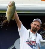 Co-angler Tim George caught a five-bass limit weighing 17 pounds, 8 ounces Saturday to secure his first-ever Stren Series win with a final total of 31-12..