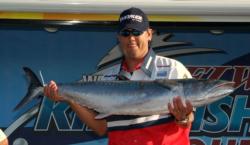 Andy Seeker of Team Koolau weighs in a 35-pound, 9-ounce kingfish, earning the team third place.