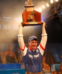 Raising a trophy high over his head, perseverance finally pays off for Aaron Hastings.