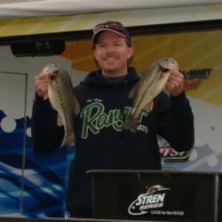 Co-angler Ed Shay leads his division after catching four bass that weighed 10 pounds, 2 ounces.