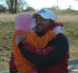 Co-angler Steven McFarland embraces his daughter after winning the Stren Series event on Bull Shoals.