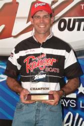 Co-angler champion Alan Hults shows off his first Stren Series trophy.