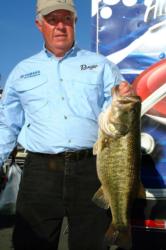 Co-angler Lewis Southard of Chandler, Ariz., proudly displays a 10-pound, 4-ounce largemouth. Southard finished the day in fourth place overall after the second day of competition.