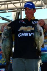Michael Rooke of Lake Havasu City, Ariz., holds up part of his four-day winning catch of 93 pounds, 5 ounces.