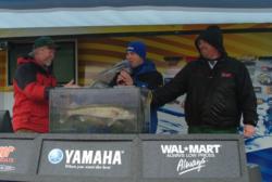 Pro Scott Banks and co-angler Michael Eichbrecht celebrate after placing their 31-pound, 5-ounce limit on the scale.