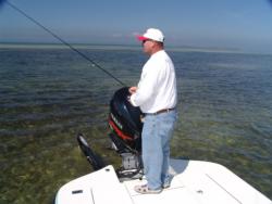 Extending off the stern of a fishing boat, the Power-Pole provides quiet, convenient control.
