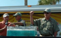 Chuck Cress and Gary Weishaar celebrate after weighing in Friday. The two took the lead with one day left on the water.