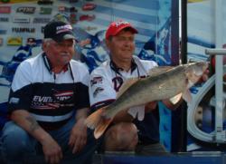 Pro Chris Burns and co-angler John Parker show off their big fish from day one. 