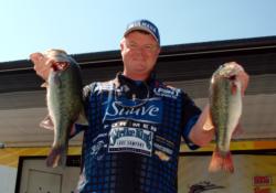 Mark Rose of Marion, Ark., holds down second place among pros competing in the Stren Central on the Columbus Pool with five bass for 15-3.