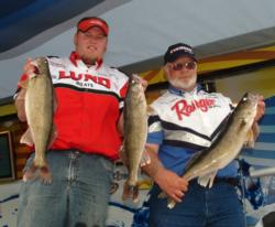 Dennis Jeffrey and Philip Zimpel hold up their biggest fish from opening day.
