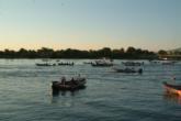 Competitor boats aim toward Lake Erie at the start of day two.