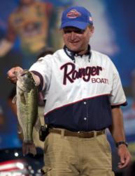 Kevin Wells of South Shore, Ky., holds one of the bass that helped pave the way to a co-angler victory at the All-American.