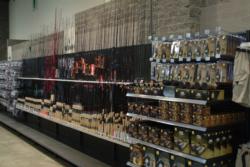 Rods line the walls of the Wal-Mart sporting goods store.