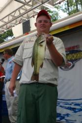 Third-place finisher Sterling Pfundheller of Arizona proudly displays his catch. 
