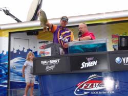 Fourth place finisher Mike Crisp was joined on stage by his 4-year-old daughter Tori.