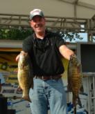 Wally Coward leads the Co-angler Division with five smallmouth bass that weighed 18 pounds, 9 ounces.