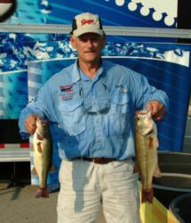 Yorkville, Ill., co-angler Chuck Loerzel is third with 12 pounds, 1 ounce.