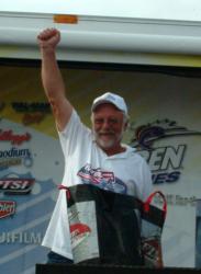 Co-angler Tony Spinks celebrates after winning the Stren Series Central Division event on Lake of the Ozarks.