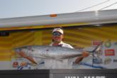 Captain D. Logan of Logan's Run shows off a 36-pound, 6-ounce king mackerel which has his team tied for second place.