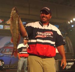 Hager City, Wis., pro Scott Fairbairn holds up his biggest walleye from day three on Lake Erie. With one day left, Fairbairn is in second place.