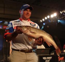 BFGoodrich Tires pro Dustin Kjelden holds up part of his 39-pound, 3-ounce catch. Kjelden leads the Pro Division with one day remaining. 