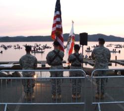 With a stunning Clear Lake sunrise as a backdrop, the National Guard presents the colors. 